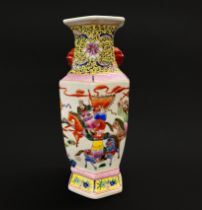 A large Chinese porcelain vase, decorated with Chinese figures, with six character mark to base,