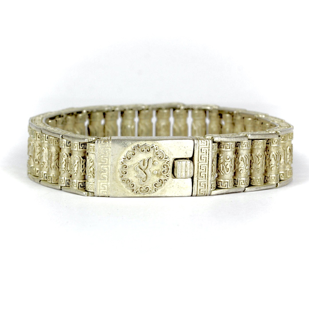 A Chinese white metal bracelet with rotating character links, L. 22cm. - Bild 2 aus 3