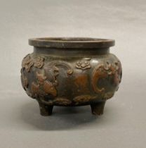 A Chinese bronze censer decorated with bats, Dia. 12cm, H. 11cm.