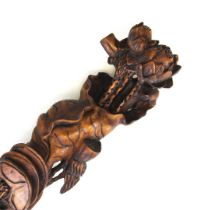 A hand carved walnut wood ruyi sceptre, L. 41cm.