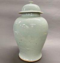 A very large 18th century Chinese celadon glazed jar and lid, H. 55cm.