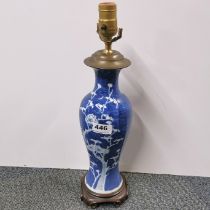 A Chinese hand painted prunus pattern porcelain vase mounted as a lamp base, H. 43cm.