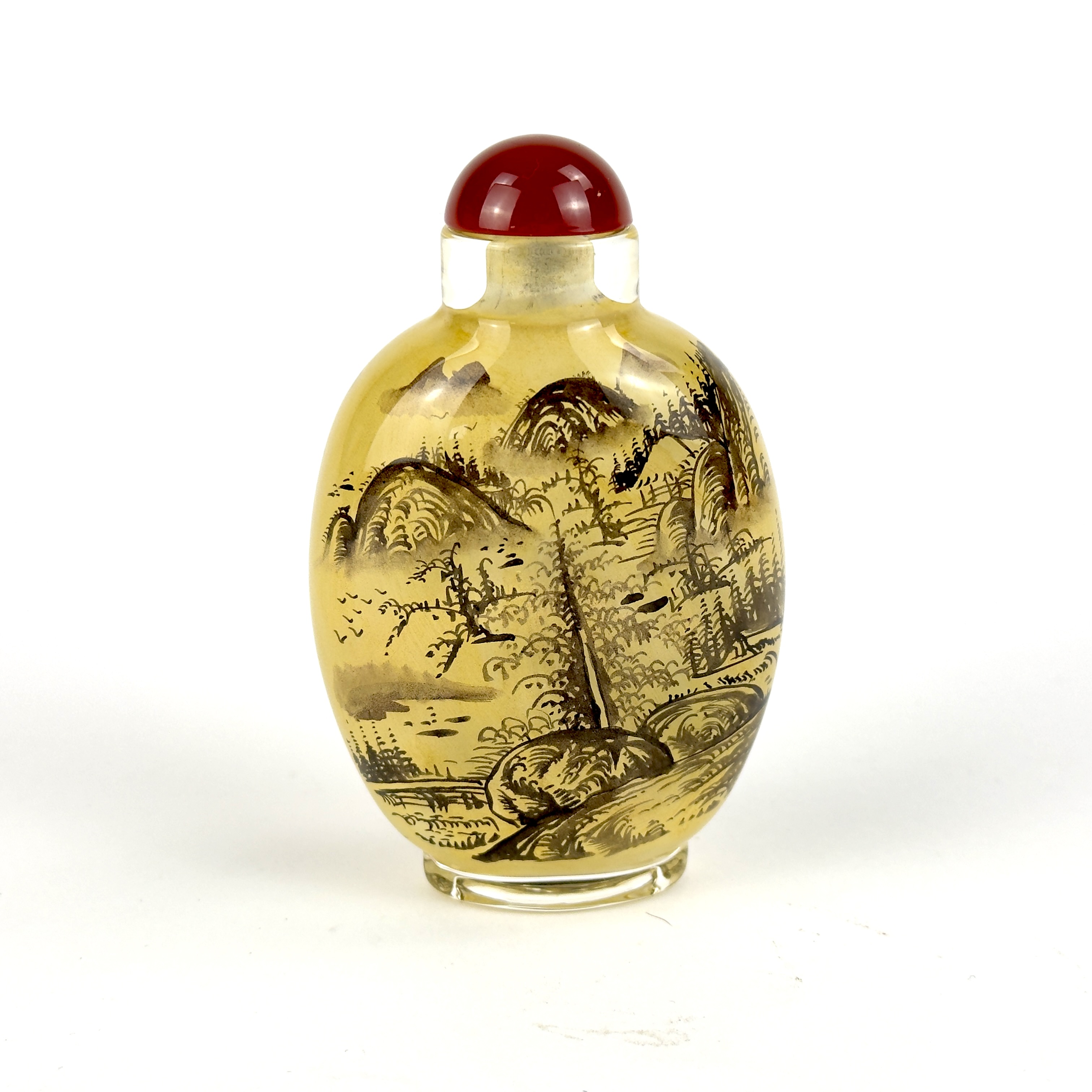 A Chinese inside painted snuff bottle with a red glass stopper, H. 8.7cm.