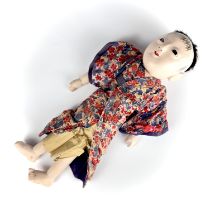 A 1950's Japanese doll, L. 35cm.