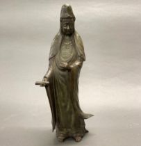 A patinated bronze figure of the goddess Guanyin standing, H. 44cm.