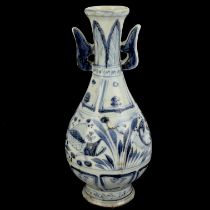 A Chinese provincial hand painted and glazed stoneware vase, H. 26cm.