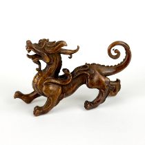 A Chinese bronze figure of a dragon, L. 8.5cm.