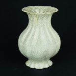 A Chinese celadon lotus-shaped crackle glazed pottery vessel. H. 15cm.