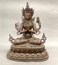 A large cast bronze figure of a seated Tara, H. 46cm.