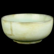 A Chinese glazed pottery bowl. H. 6cm., Dia. 13cm.