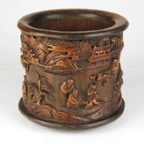 A Chinese carved bamboo brush pot, H. 15.5cm. Dia. 16.5cm.