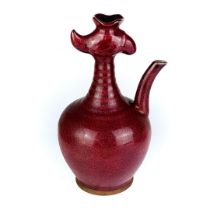 A Chinese red glazed bird beek water dropper, H. 22.5cm.