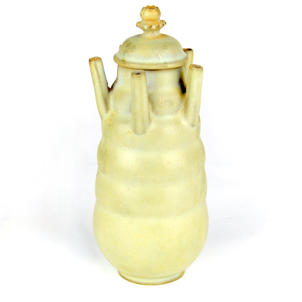 A Chinese five-wick oil lamp, H. 17.5cm.