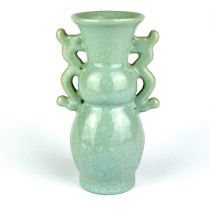 A Chinese celadon crackle glazed pottery vase. H. 21cm.