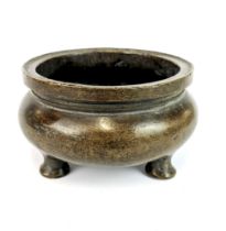 A mid 20th century Chinese cast bronze censer, dia. 13cm, D. 7cm.