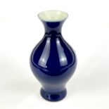 A small signed Chinese imperial blue glazed vase, H. 13cm.