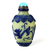 A Chinese carved Peking cameo glass snuff bottle, H. 8.5cm.