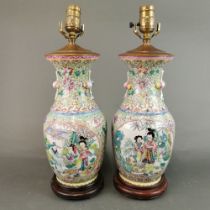 A pair of Chinese hand enamelled porcelain vases mounted as table lamps, H. 44cm.
