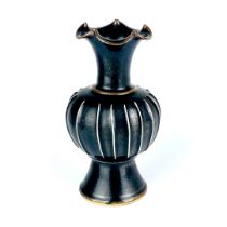 A Chinese ribbed porcelain vase, H. 18cm.