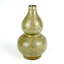 A Chinese crackle glazed double gourd vase. H. 24cm.