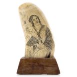 Ø A FINE SAILOR'S SCRIMSHAW DECORATED WHALE'S TOOTH, CIRCA 1840