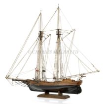 A WELL-RIGGED MODEL OF A 19TH CENTURY TWIN-MASTED TRADING SCHOONER