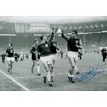 Former West Ham Star Geoff Hurst Signed 12x8 inch Black and White Photo. Good condition. All