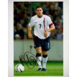 Former England FC Star David Dunn Signed 10x8 inch Colour Photo. Good condition. All autographs come