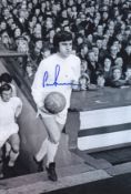 Autographed Peter Lorimer 12 X 8 Photo - B/W, Depicting Leeds United Midfielder Peter Lorimer