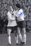 Autographed Roy Mcfarland 12 X 8 Photo - B/W Depicting Derby County's Roy Mcfarland Congratulating
