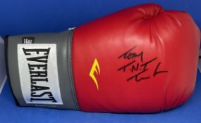 Boxing Tony TNT Tucker signed Red Everlast 16oz Boxing Glove. Good condition. All autographs come