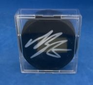 American Ice Hockey Player Magnus Paajarvi Signed Official NHL Puck. Signed in silver ink. Housed in