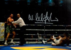 Boxing Star Wladimir Klitschko Signed 12 x 8 inch Colour Photo Showing Wladimir Klitschko Knocking