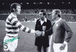 Autographed Billy McNeill 12 X 8 Photo - B/W, Depicting Man United Captain Bobby Charlton Shaking
