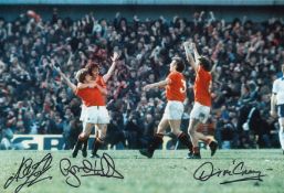 Autographed Man United 12 X 8 Photo - Col, Depicting Gordon Hill Being Congratulated By Team Mates
