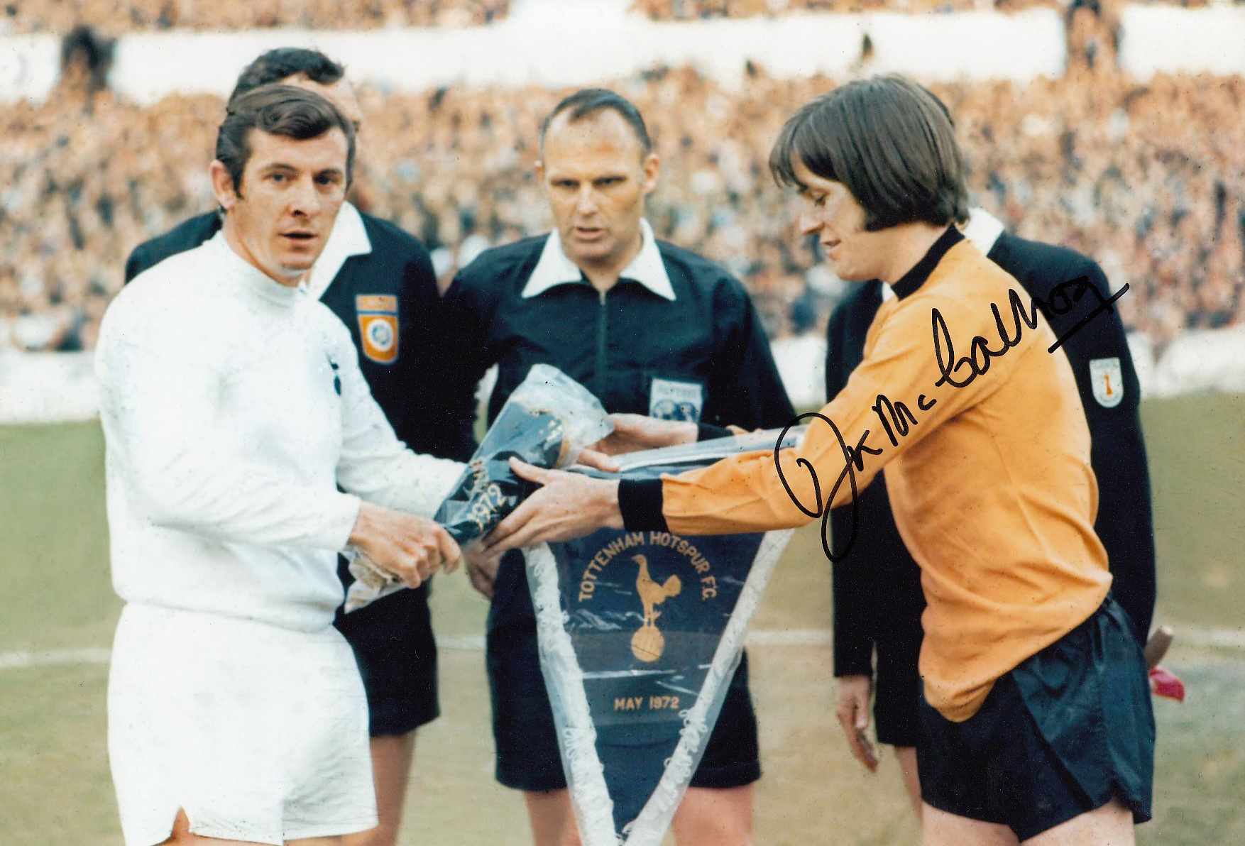 Autographed Jim Mccalliog 12 X 8 Photo - Col, Depicting Tottenham Captain Alan Mullery Exchanging