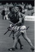 Autographed Ipswich Town 6 X 4 Photo - B/W, Depicting Ipswich Town's John Wark Being Congratulated