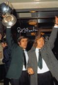 Autographed Pat Stanton 12 X 8 Photo - Col, Depicting Hibernian Captain Pat Stanton Holding Aloft