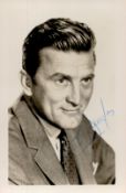 Kirk Douglas Signed 5 x 3 inch Early Black and White Photo. Signed in blue ink. Good Condition.