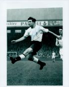 Bobby Smith signed 10x8 black and white photo picturing the Spurs legend in action. All autographs