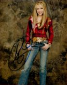 Miley Cyrus signed 10x8 colour photo. All autographs come with a Certificate of Authenticity. We