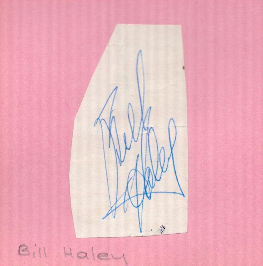 Bill Haley Signed Signature Cutting, Affixed to pink Paper. Signed in blue ink. Good Condition.