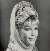 Barbara Eden signed 7x7 black and white magazine photo. All autographs come with a Certificate of