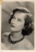 Merle Oberon signed 7x5 vintage black and white photo. All autographs come with a Certificate of