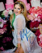 Meghan Trainor signed 10x8 colour photo. All autographs come with a Certificate of Authenticity.