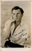 Kenneth More Signed 5x3 inch Vintage Black and White Photo. Signed in blue ink. Good Condition.