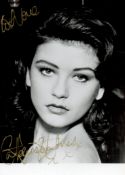 Catherine Zeta-Jones CBE Signed 7 x 5 inch Black and White Photo. Signed in gold ink. Good