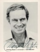 Charlton Heston Signed 5 x 4 inch approx Black and White Photo. Signed in black ink. Good Condition.