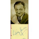 Sid James signed 5x4 album page and 7x5 vintage black and white photo.. All autographs come with a