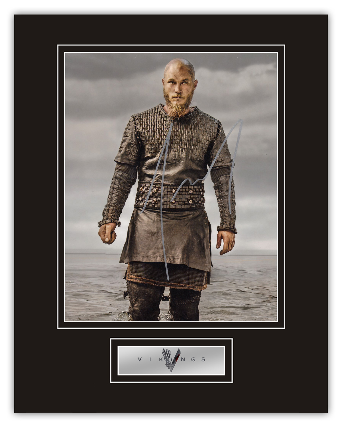Stunning Display! Vikings Travis Fimmel hand signed professionally mounted display. This beautiful